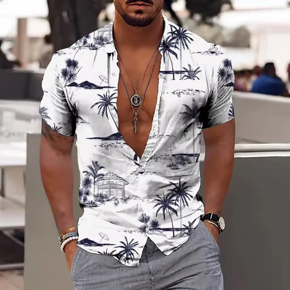 Man wearing a loose-fitting short sleeve shirt with a colourful floral pattern, cardigan style.