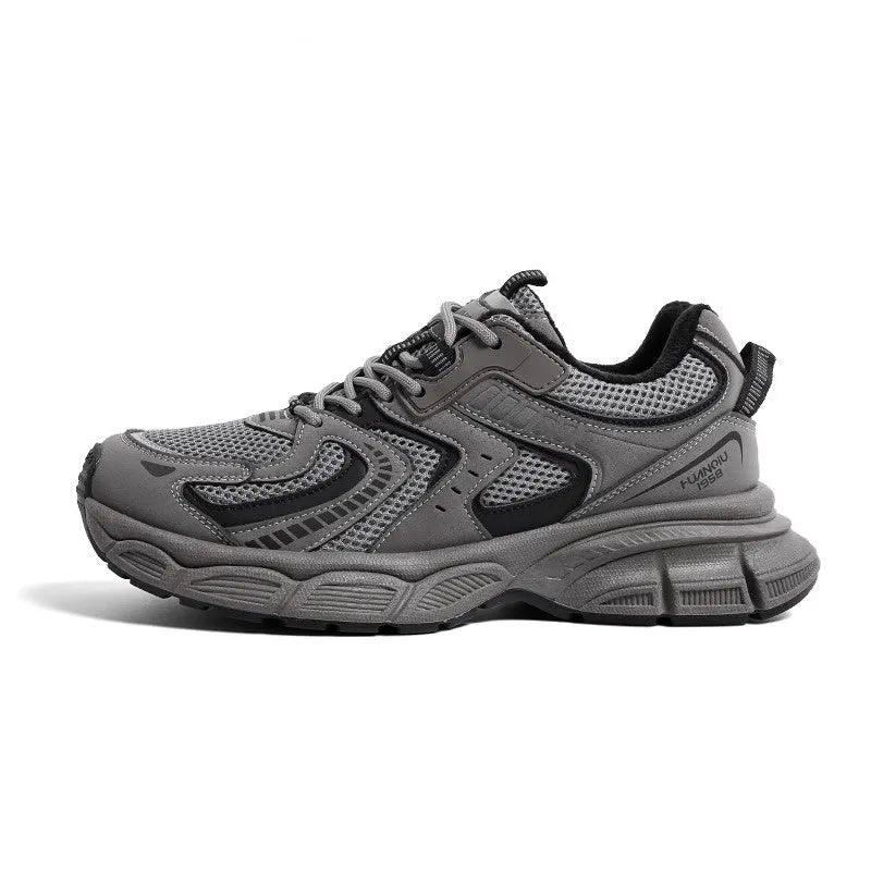 Grey low-top platform casual sneakers with leather stitching detail on a PU mesh upper.
