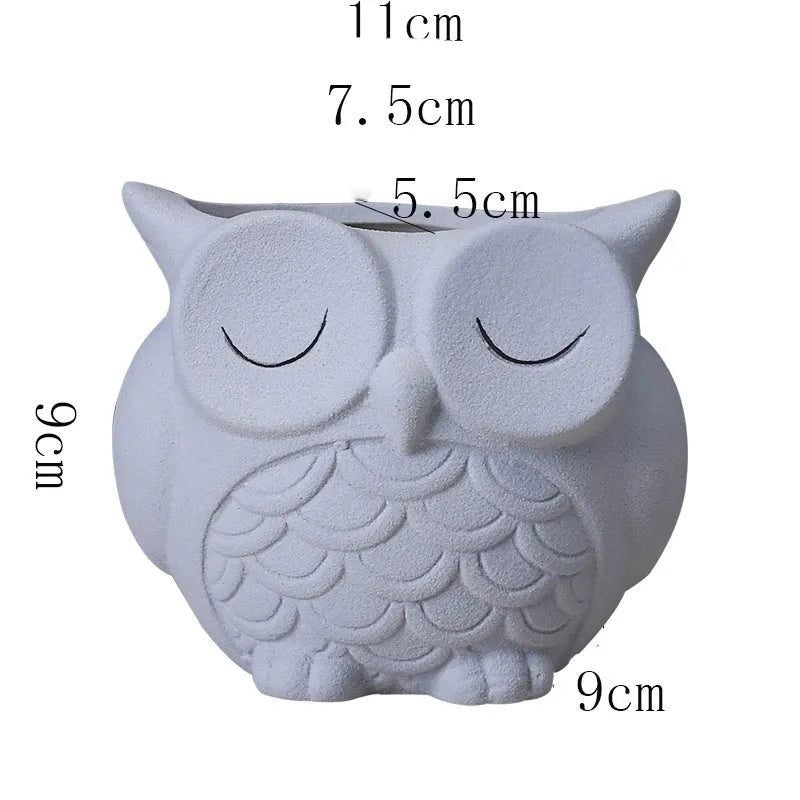 Handmade frosted ceramic flower pot with cartoon owl design for succulents.