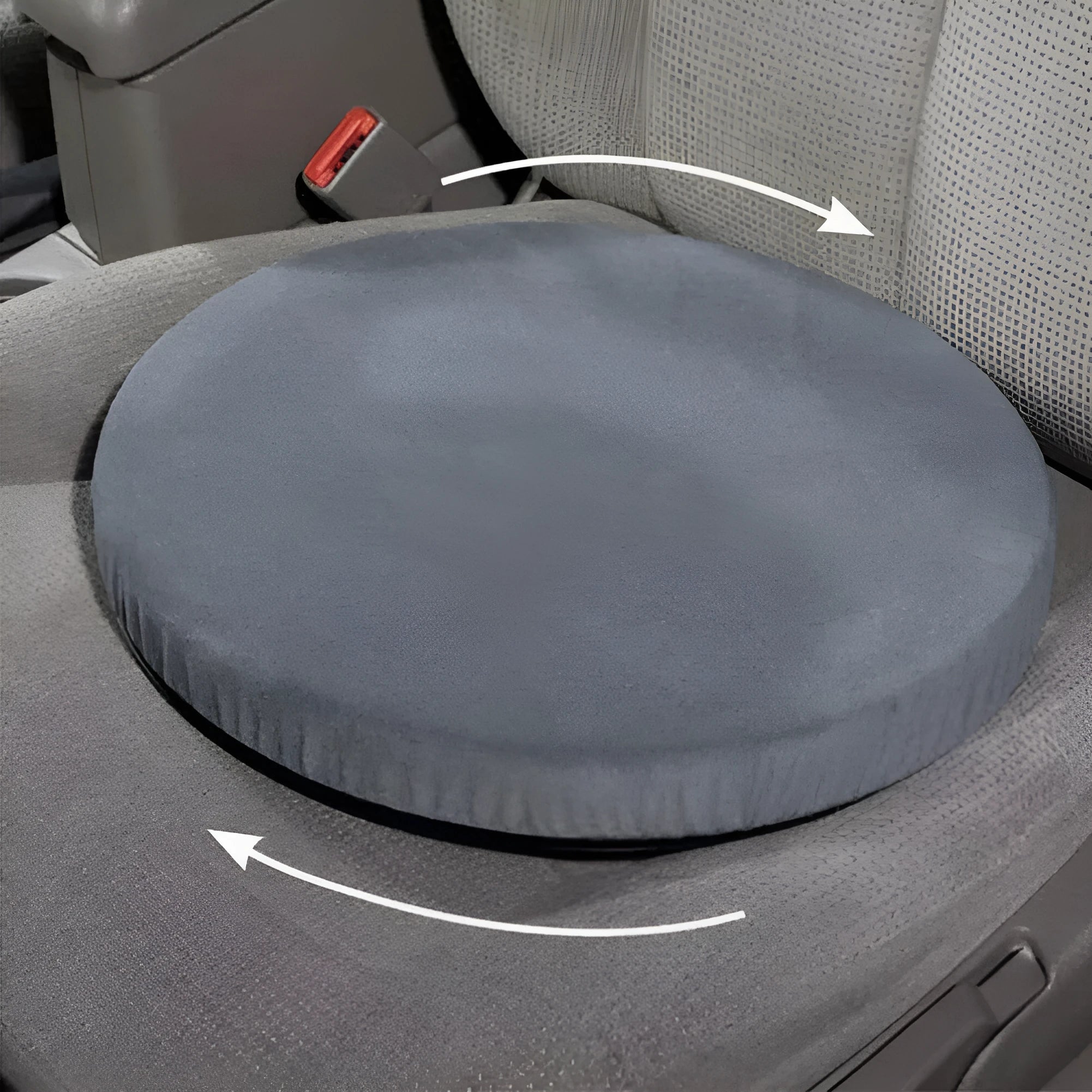 Round grey car seat cushion with a rotating base, shown on a car seat.