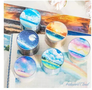 Japanese paper washi tape roll with sky theme designs including clouds, sun, twilight, moon, and nebula