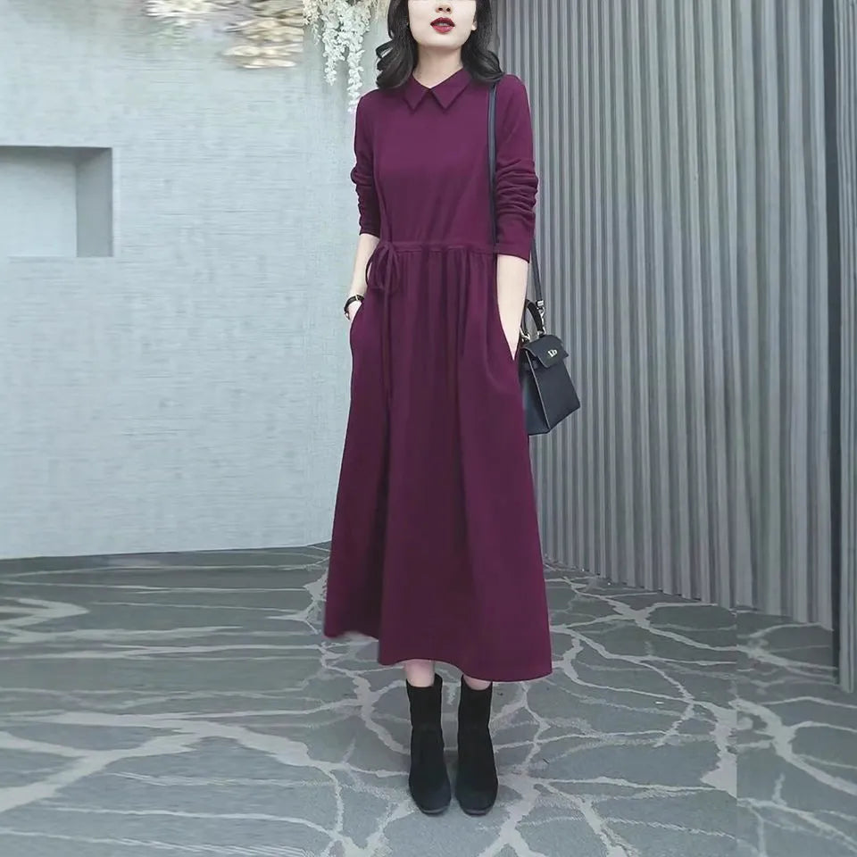 Purplish red women's plus size dress with extra long sleeves and urban style design