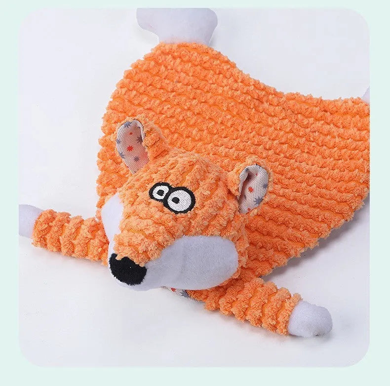 Brown velvet fox elephant plush dog toy with sound element for chewing and boredom relief.