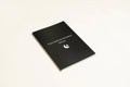 Black hardcover dream journal notebook with dot grid paper for dream recording