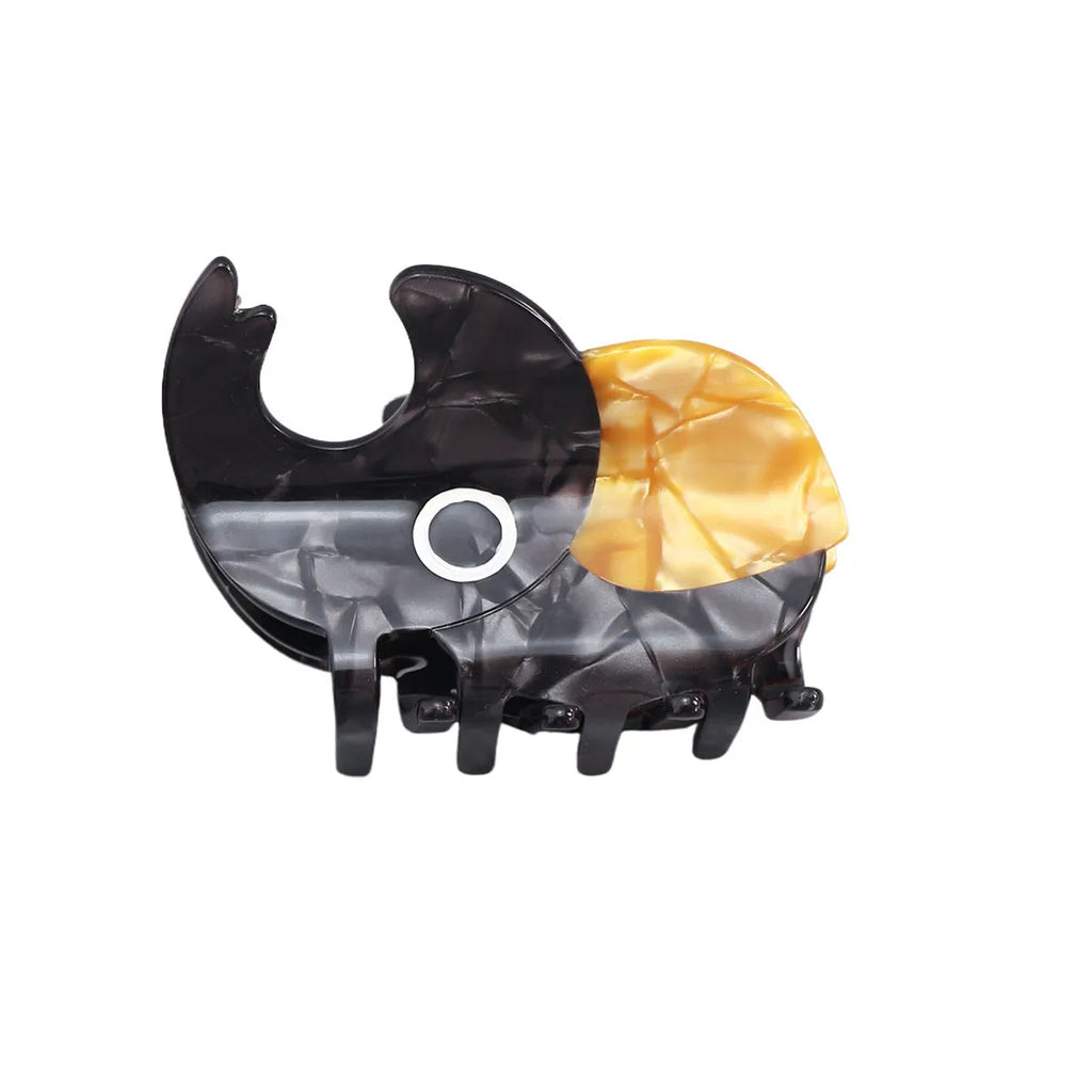 Handmade cellulose acetate Beetle Grip insect biology teaching tool with cartoon caterpillar design