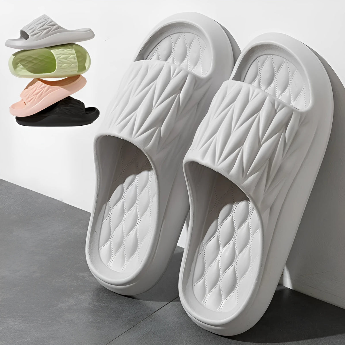 Leaf texture design EVA slippers for men and women in assorted colours on a white background.