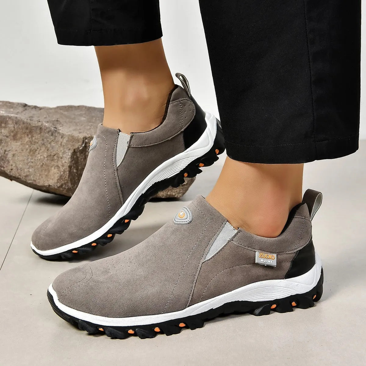 Men's round head slip-on shoe covers in various colours on a white background