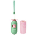 Portable dog poop bag dispenser capsule in strawberry design with a roll of fragranced bags.
