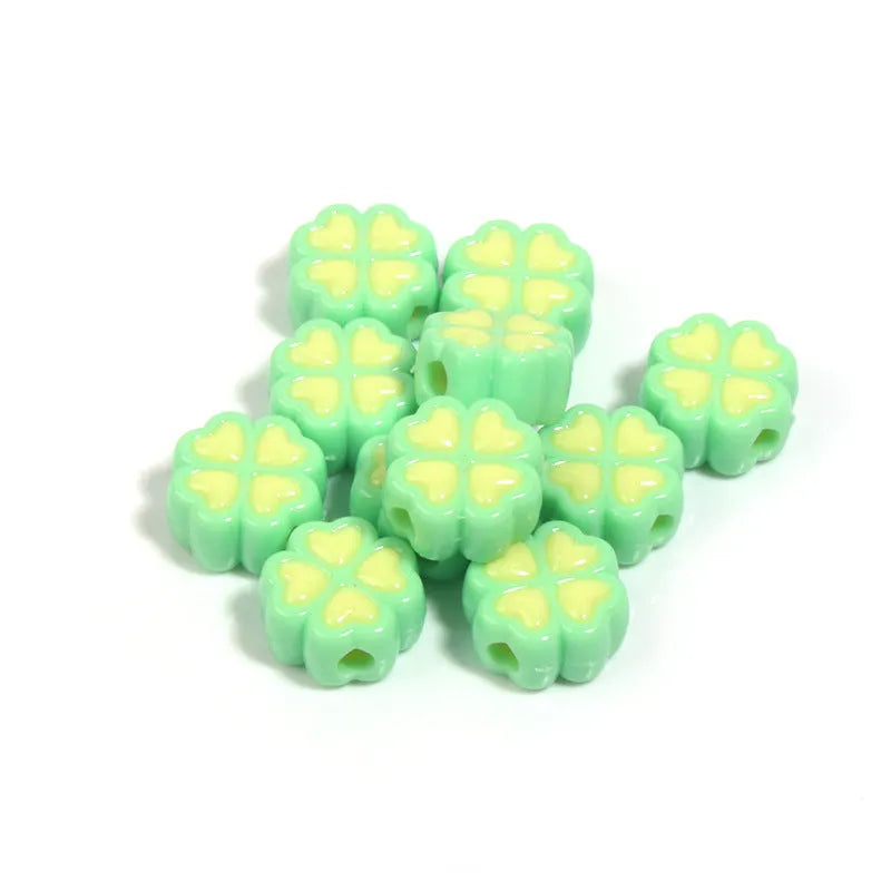 15mm acrylic four-leaf clover beads with frosted finish in light colours including pink, yellow, green and blue
