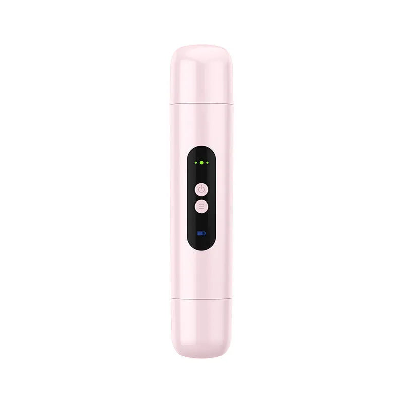 White portable electric armpit hair trimmer with USB cable on pink background