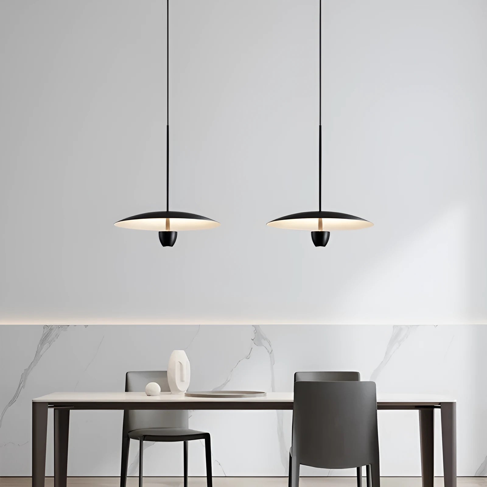 Black modern minimalist chandelier with clean lines and warm lighting