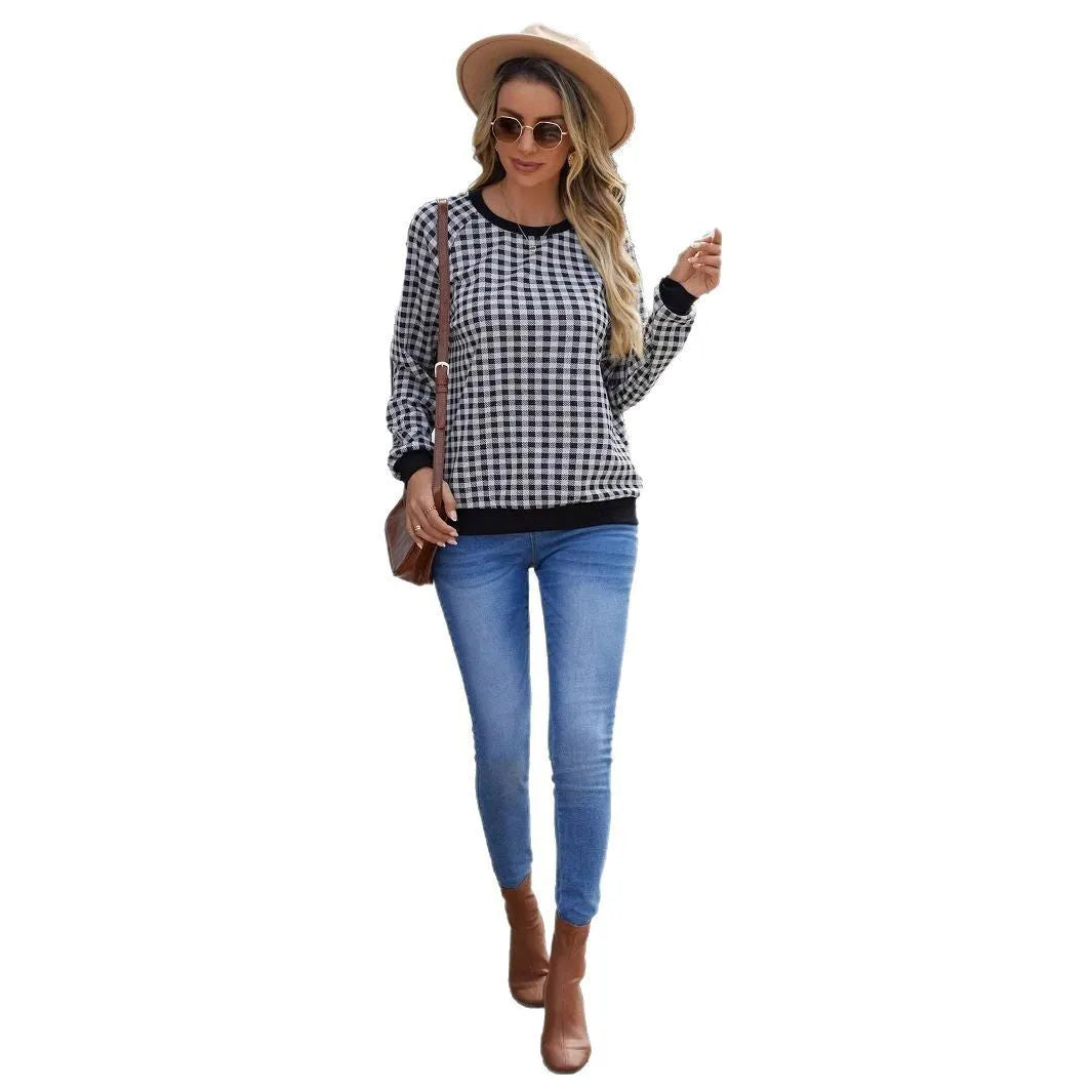 Black long sleeve polyester sweater with striped plaid print pattern