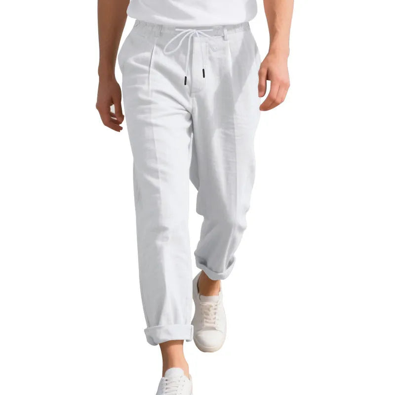 Men's casual linen trousers in a straight leg cut with a drawstring waist, shown in a light colour.
