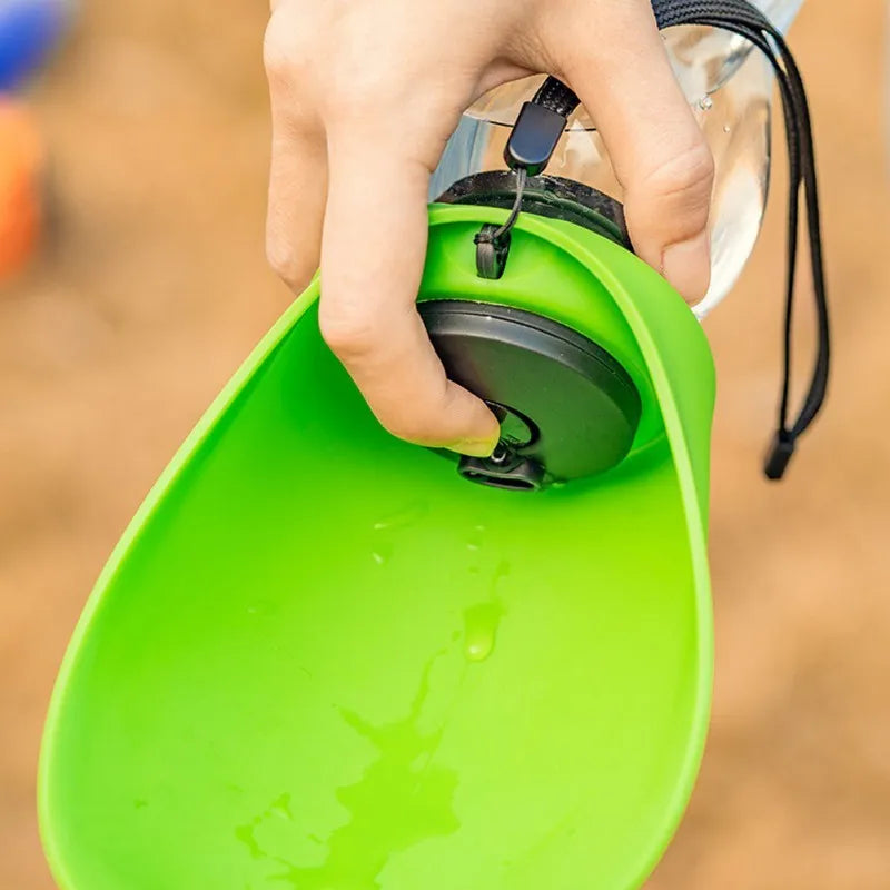 Portable blue dog water bottle with drinking bowl and hanging loop, 680ml capacity