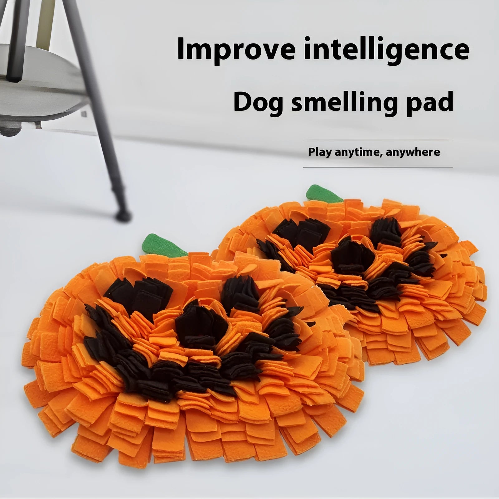 Orange pumpkin-shaped pet smell mat with textured pockets for dog training and slow feeding.