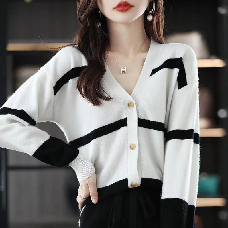 Women's striped V-neck button knitted cardigan with a 3D pattern in a slim fit.