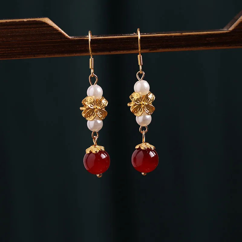 Gold electroplated alloy geometric earrings with vintage Chinese court style design