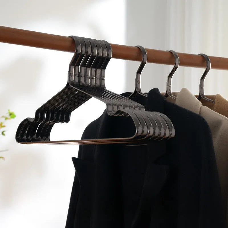 Black steel wire clothes hanger with non-slip coating for trousers and ties.