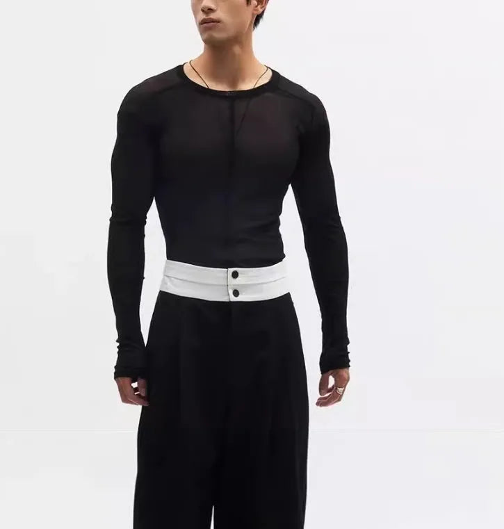 Black slim-fit long sleeve pullover made from ultra-thin see-through PU mesh fabric on a hanger.