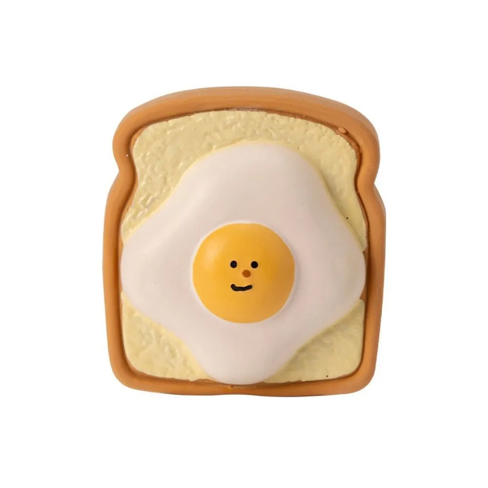 Bread shaped dog chew toy with cartoon pattern in yellow latex with squeaker
