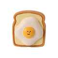 Bread shaped dog chew toy with cartoon pattern in yellow latex with squeaker