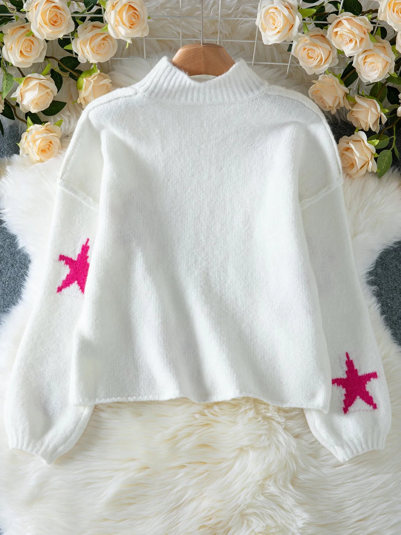 White women's turtleneck pullover with five-pointed star pattern and velvet-like fabric