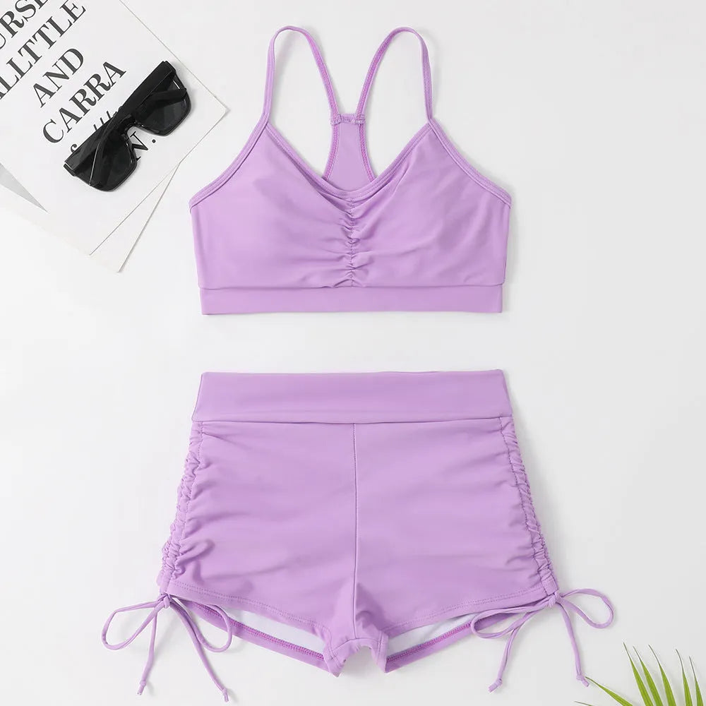Women's high waist split bikini set in purple and black with nylon spandex lining for swimming