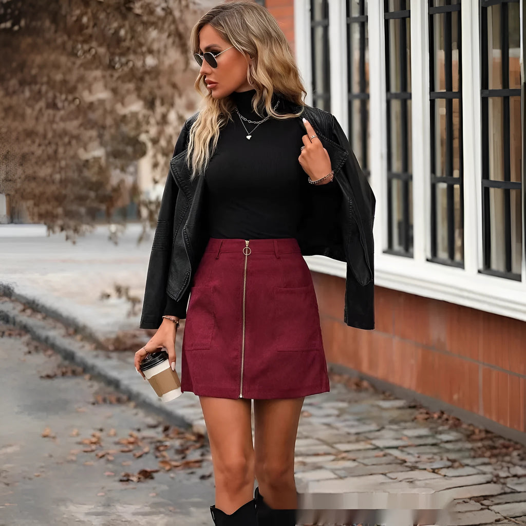 Women's high waist short skirt with front zipper and stitching detail in black colour