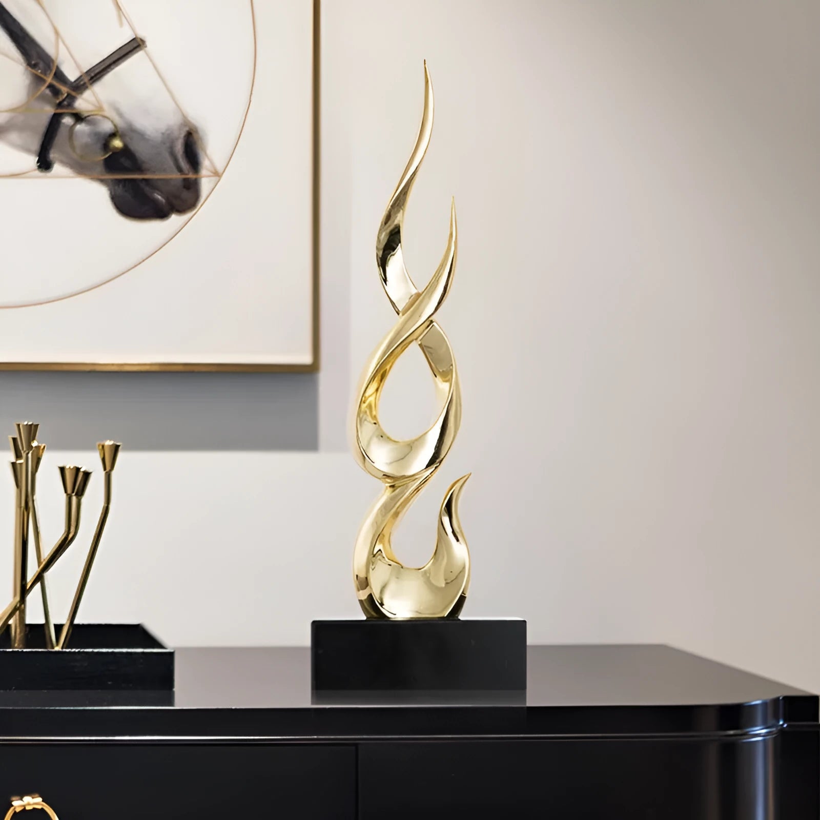 Modern resin festival decoration in bright gold metallic finish with half-handmade construction