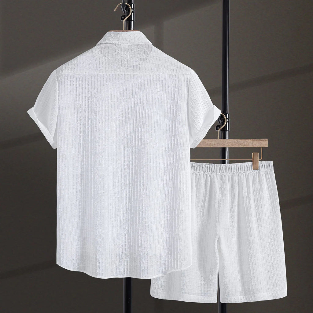 Man wearing a white cotton blend jacquard short sleeve shirt and matching shorts casual suit