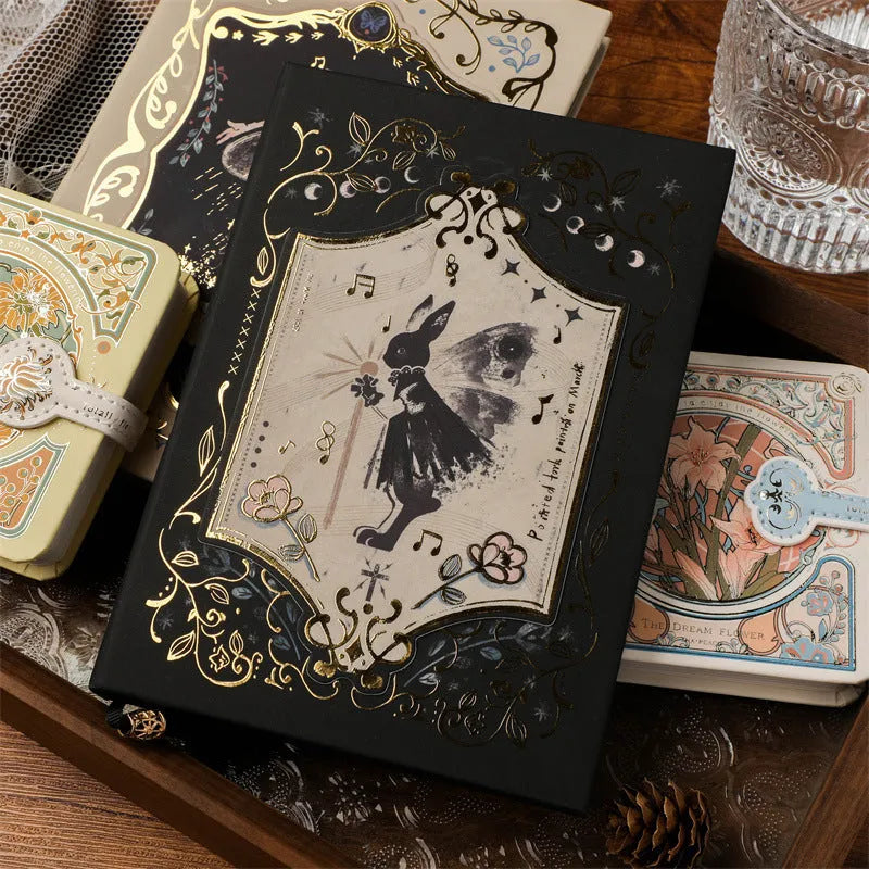Retro gothic style A5 notebook open on a table, showing detailed cover art and wood pulp paper pages.