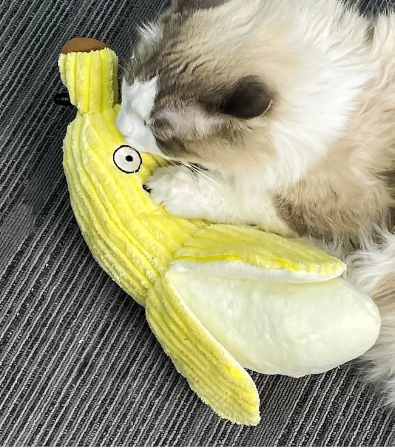 Yellow banana-shaped cat crinkle toy measuring 13 inches long with plush material