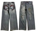 Grey washed-out wide-leg denim jeans for men with a retro workwear design and straight leg opening.