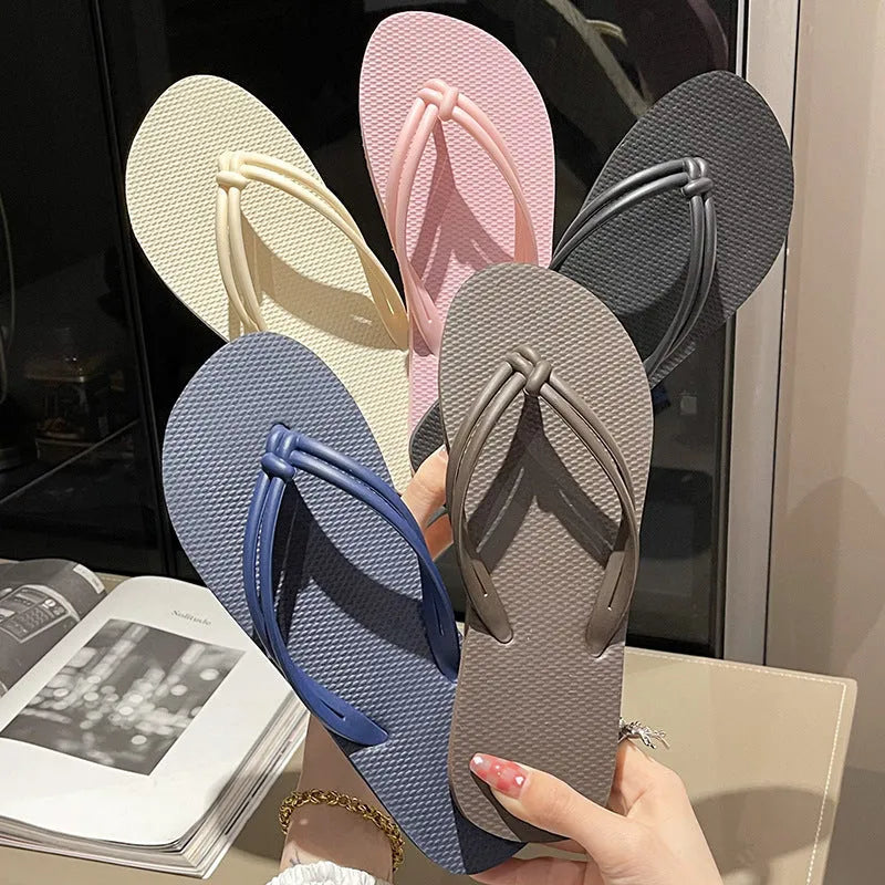 PVC casual flip flops for men with a toe-covering design and textured non-slip soles.