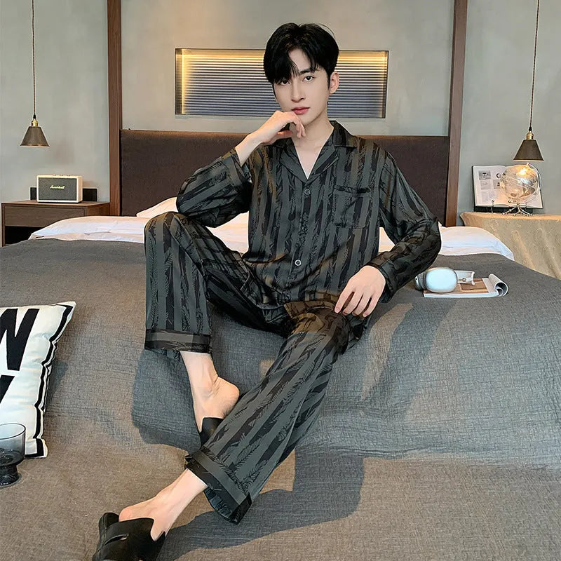 Men's black striped Ice Silk pajama set with long sleeves and trousers.