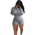 Women's off-shoulder two-piece set with long sleeves and matching shorts in solid colour
