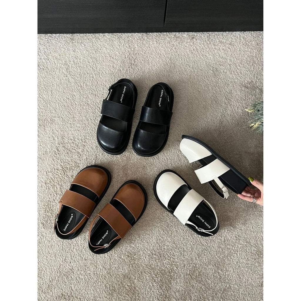 Women's retro apricot closed-toe sandals with an ankle strap buckle on a microfiber upper.