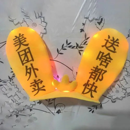 Rabbit Glow Ears helmet decoration with locomotive and ski designs on a Velcro base