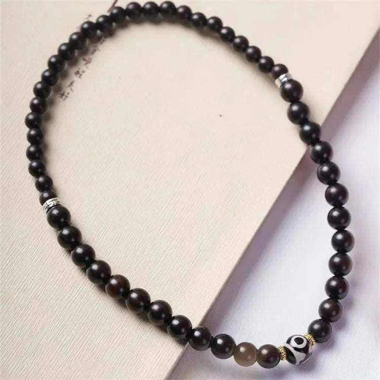 Ebony wooden Tibetan beads bracelet with two circles in 8mm unisex design