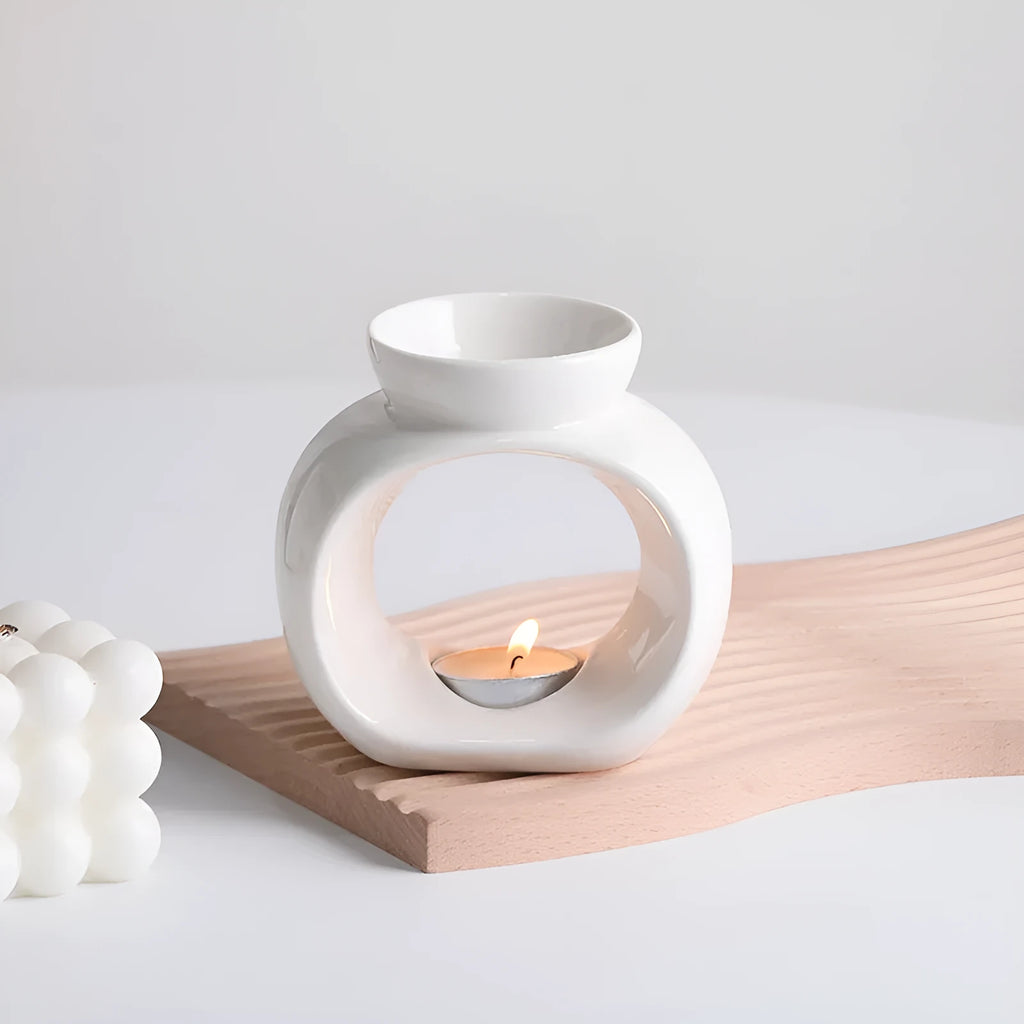 White ceramic Nordic style aromatherapy stove ornament with anti-dry burning design