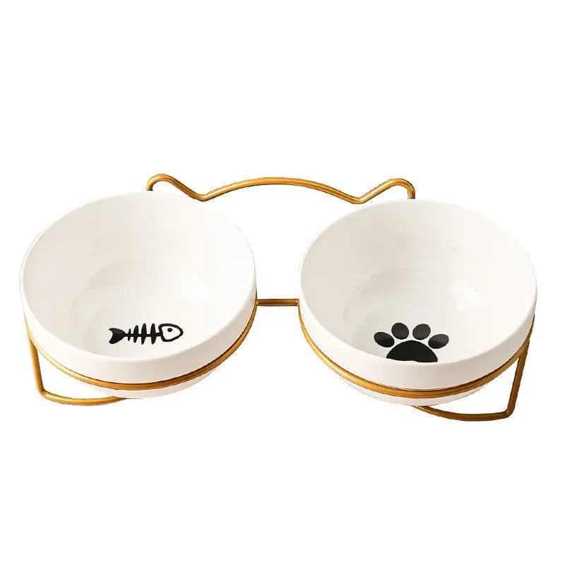 White ceramic cat bowl with cat paw design in black iron frame with cat ears