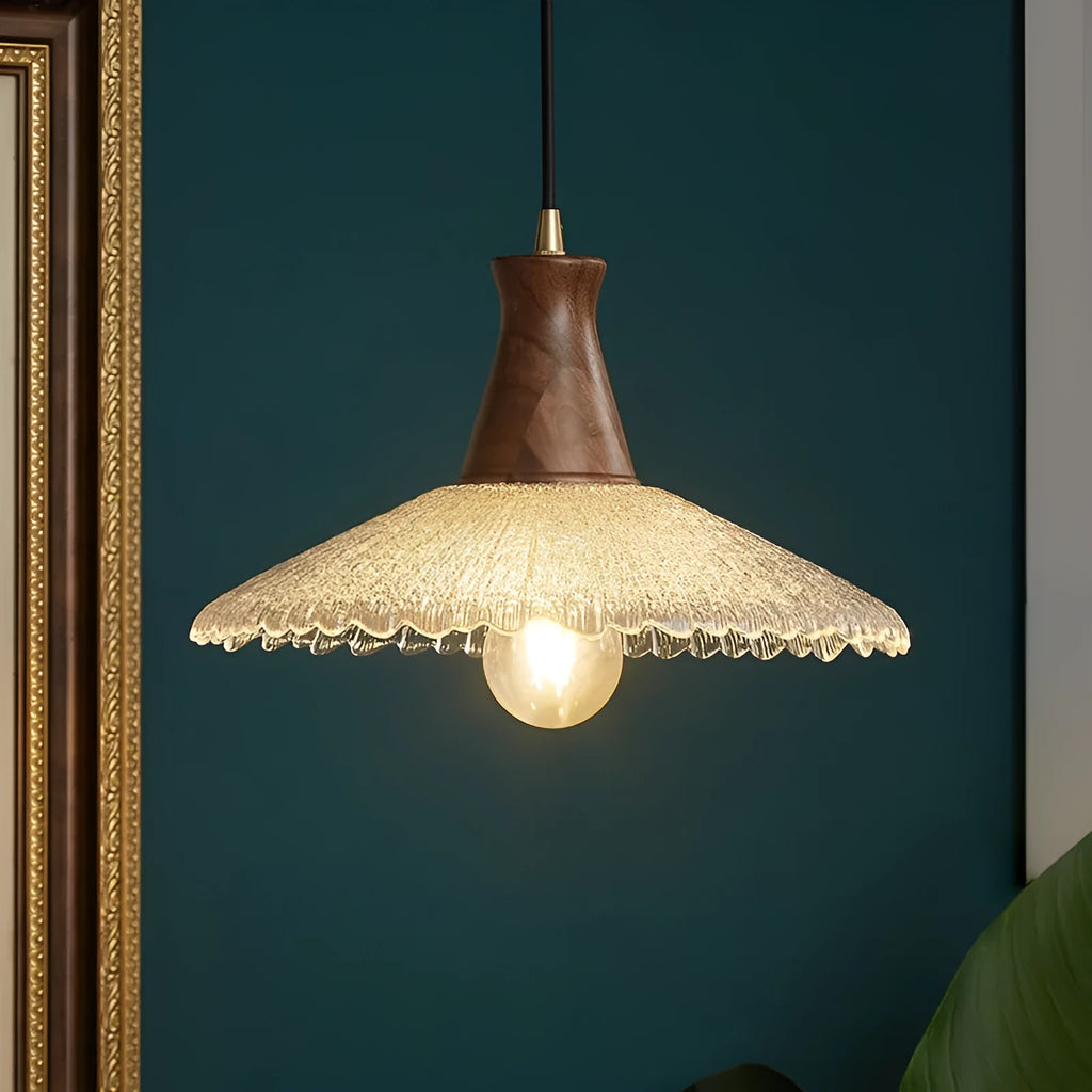 Retro wood and brass chandelier with glass shade in three size options for ceiling mounting.