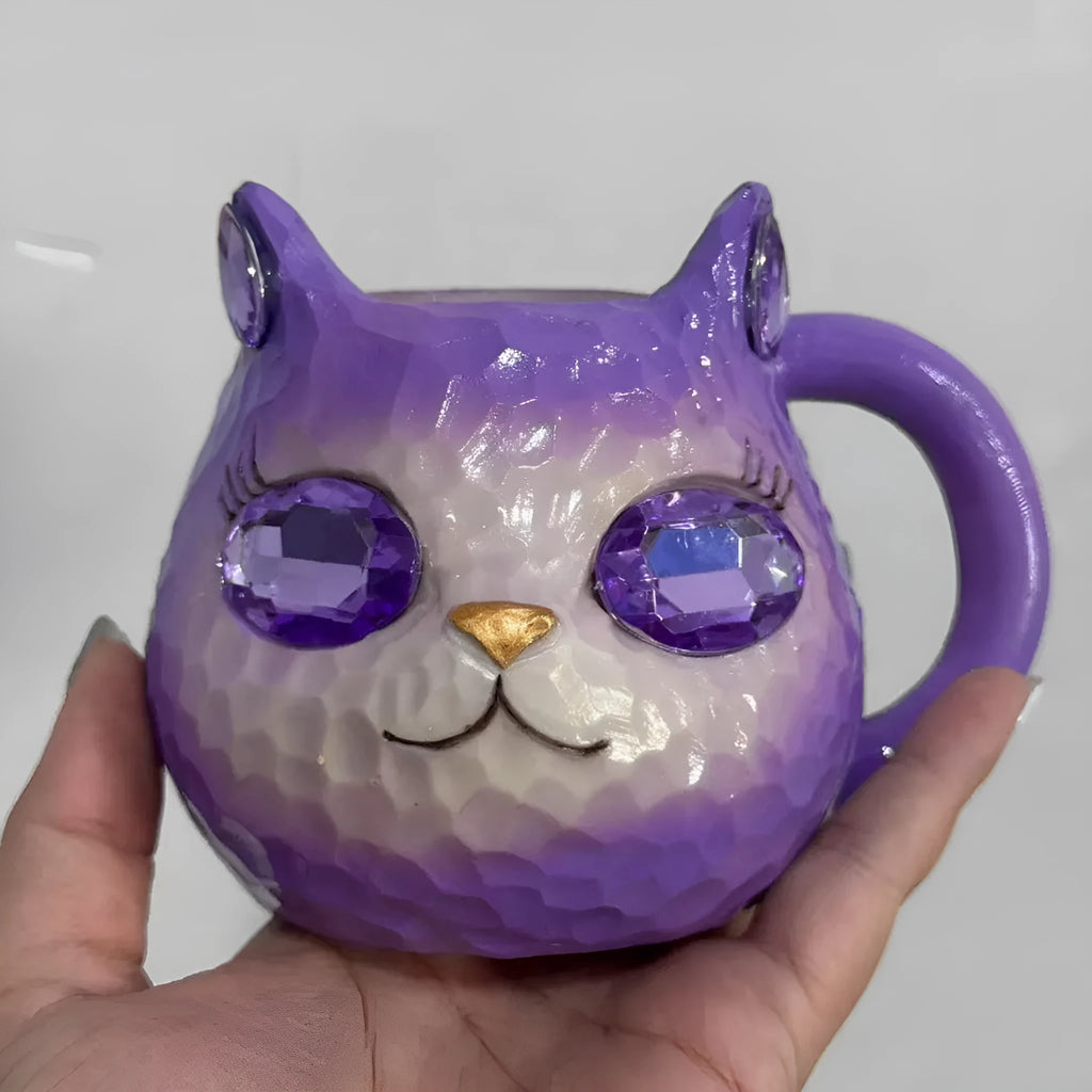 Resin crystal earth cat cup craft ornament in blue, green, pink or purple for promotional gifting.