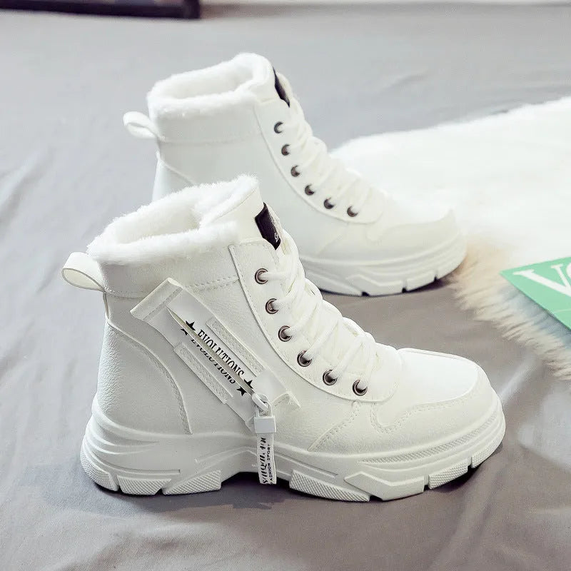 Women's plus size black snow boot with fleece lining and lace-up front on a rubber sole.