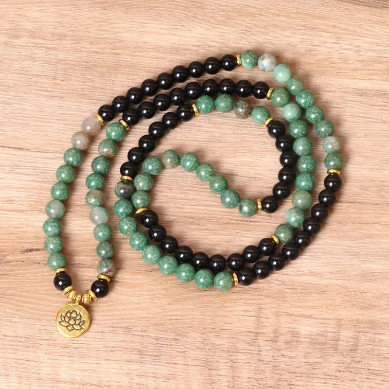 Green and black elastic beaded alloy bracelet with natural style design