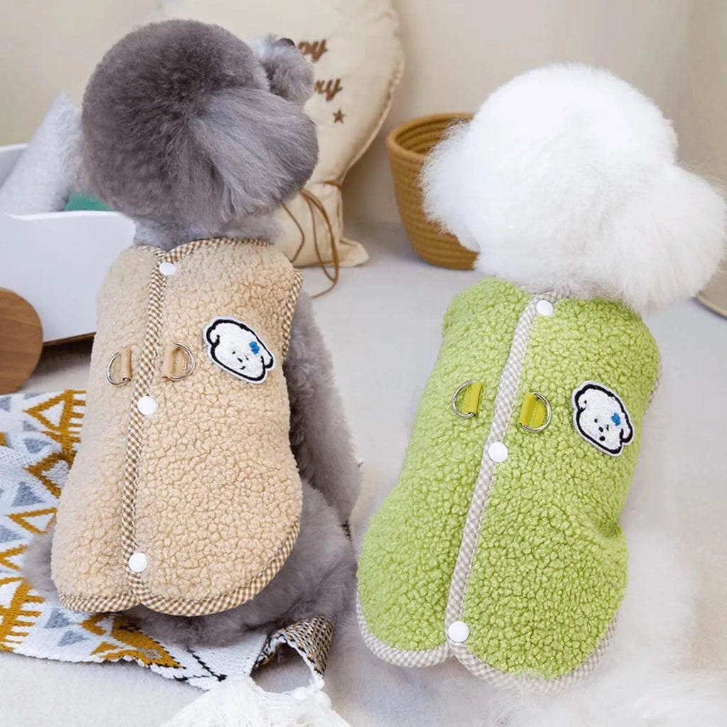 Green thickened coral fleece dog vest with a metal leash ring on the back, laid flat.