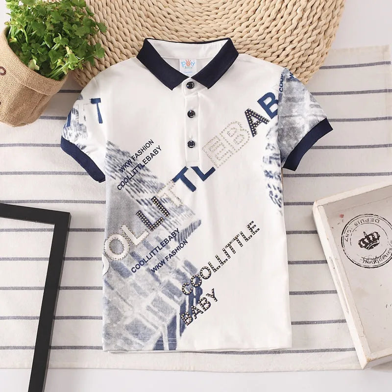 Boys' short sleeve cotton shirt in a solid colour with a lapel collar, shown on a hanger.