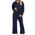 Women's black knitted jacquard lounge suit set with geometric pattern, featuring a long sleeve top and elastic waist cropped trousers.