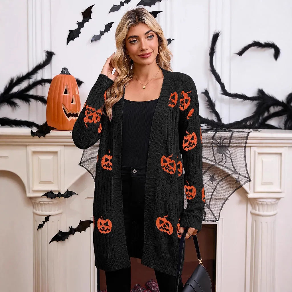 Women's black Halloween cardigan with orange pumpkin head jacquard pattern, straight cut with regular sleeves.