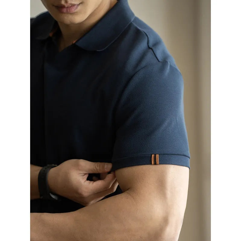 American-style cotton blend short-sleeved polo shirt in blue, shown in a regular fit for casual summer wear.